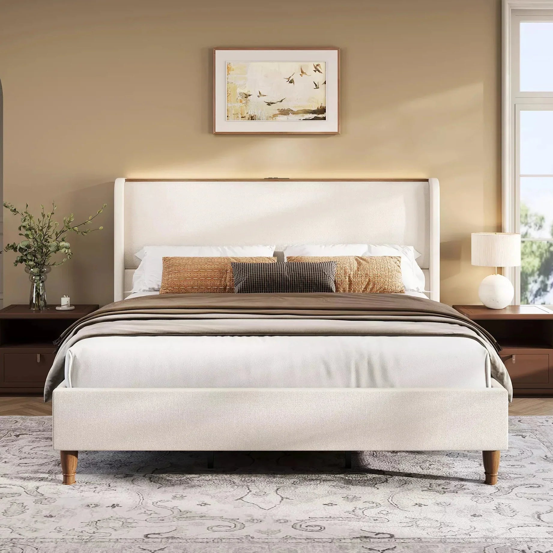 Neatly made bed with decorative pillows in a bedroom setting.